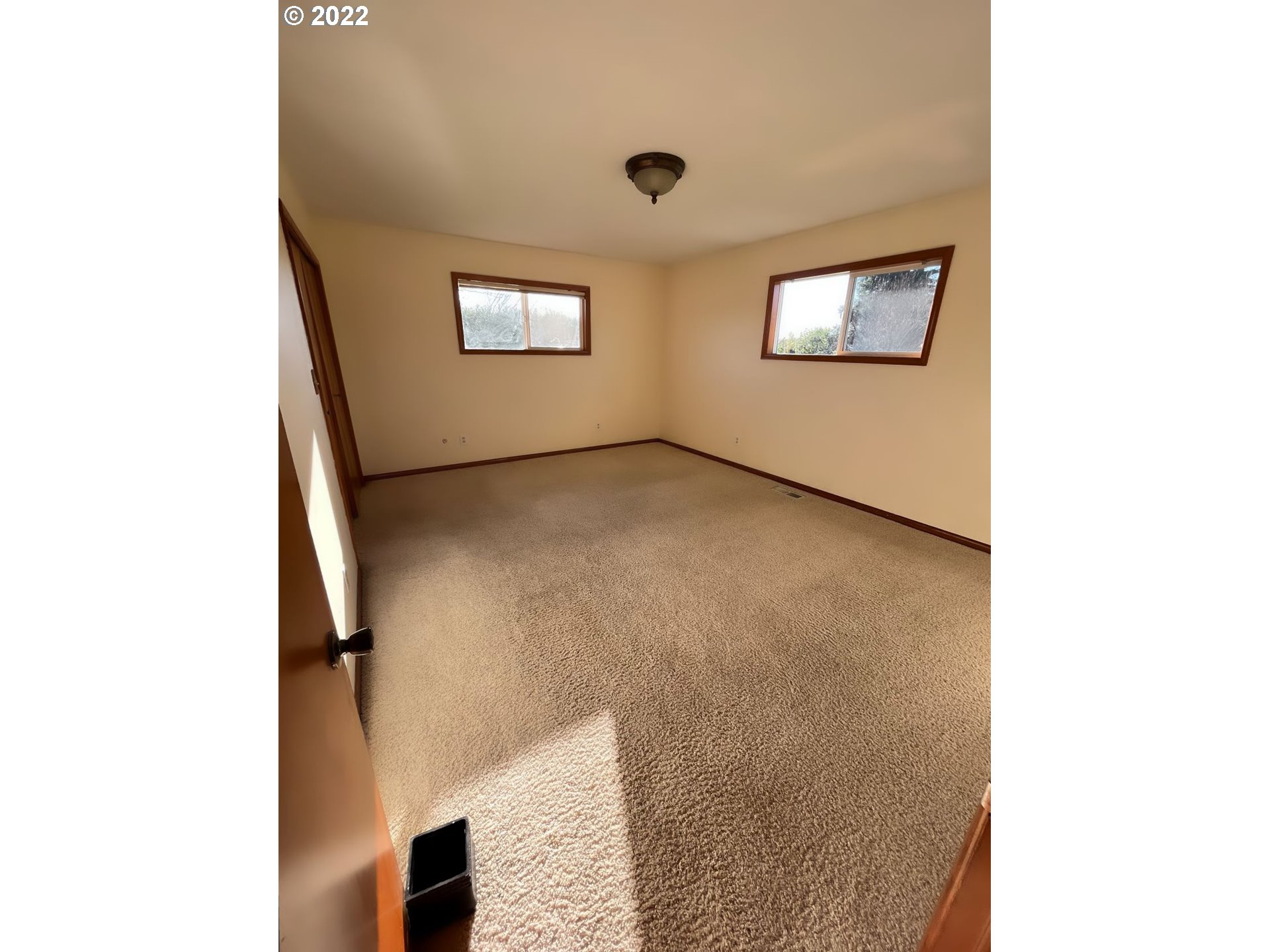 1675 Makinster Road Tillamook, OR 97141 - Photo 11 of 29 a view of an empty room with windows
