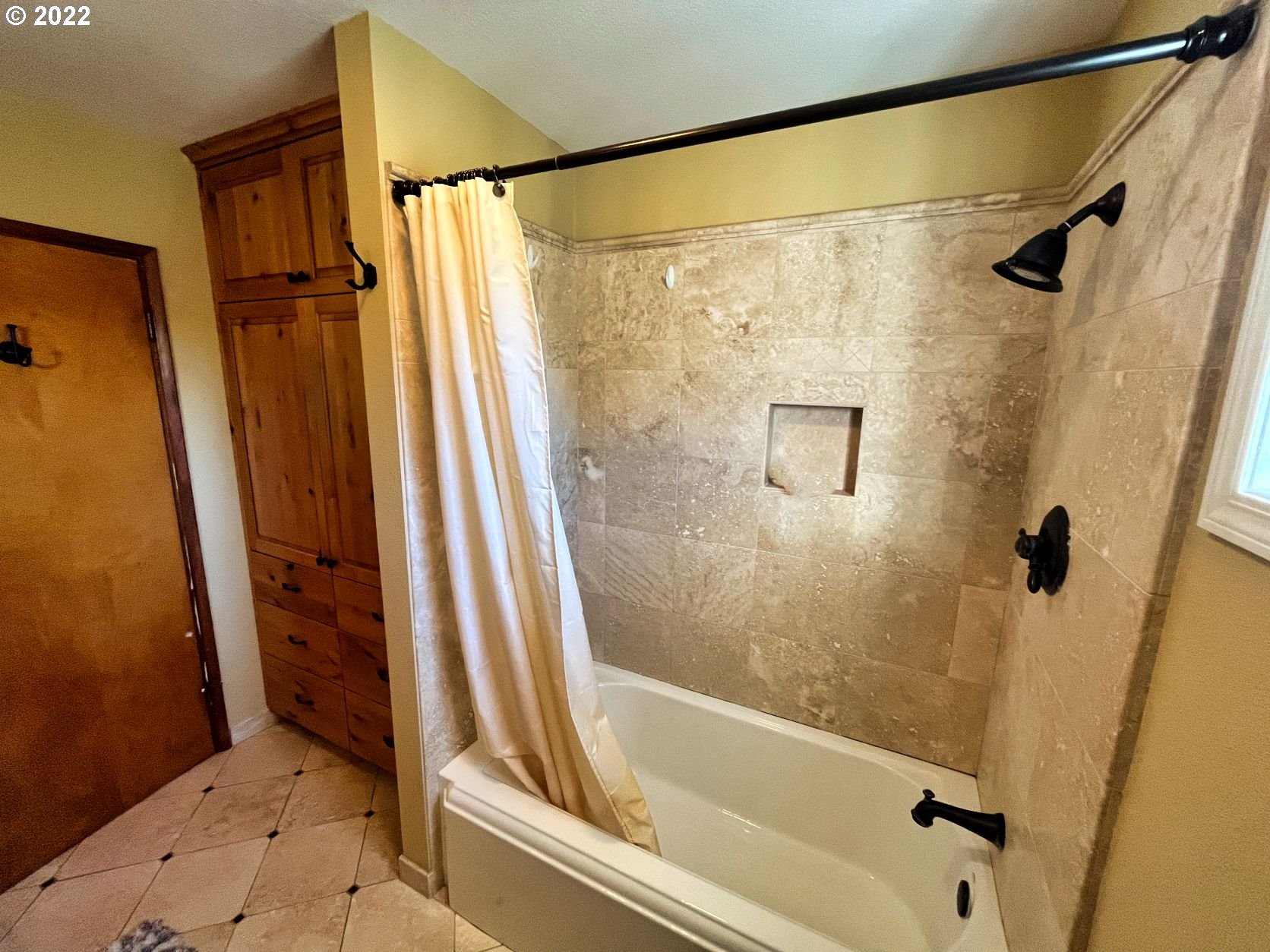 1675 Makinster Road Tillamook, OR 97141 - Photo 14 of 29 a bathroom with a shower and a tub