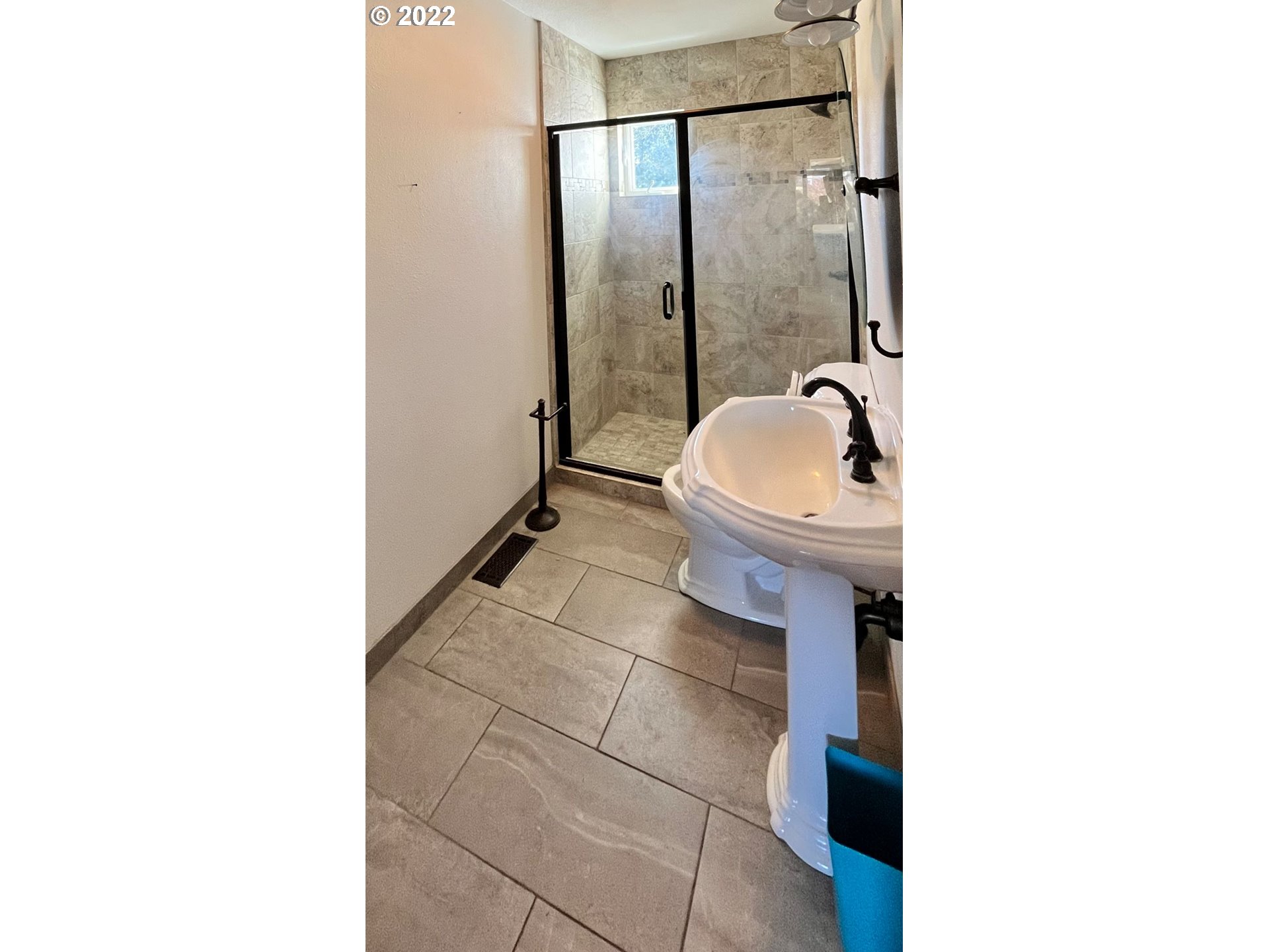 1675 Makinster Road Tillamook, OR 97141 - Photo 15 of 29 a bathroom with a sink and mirror