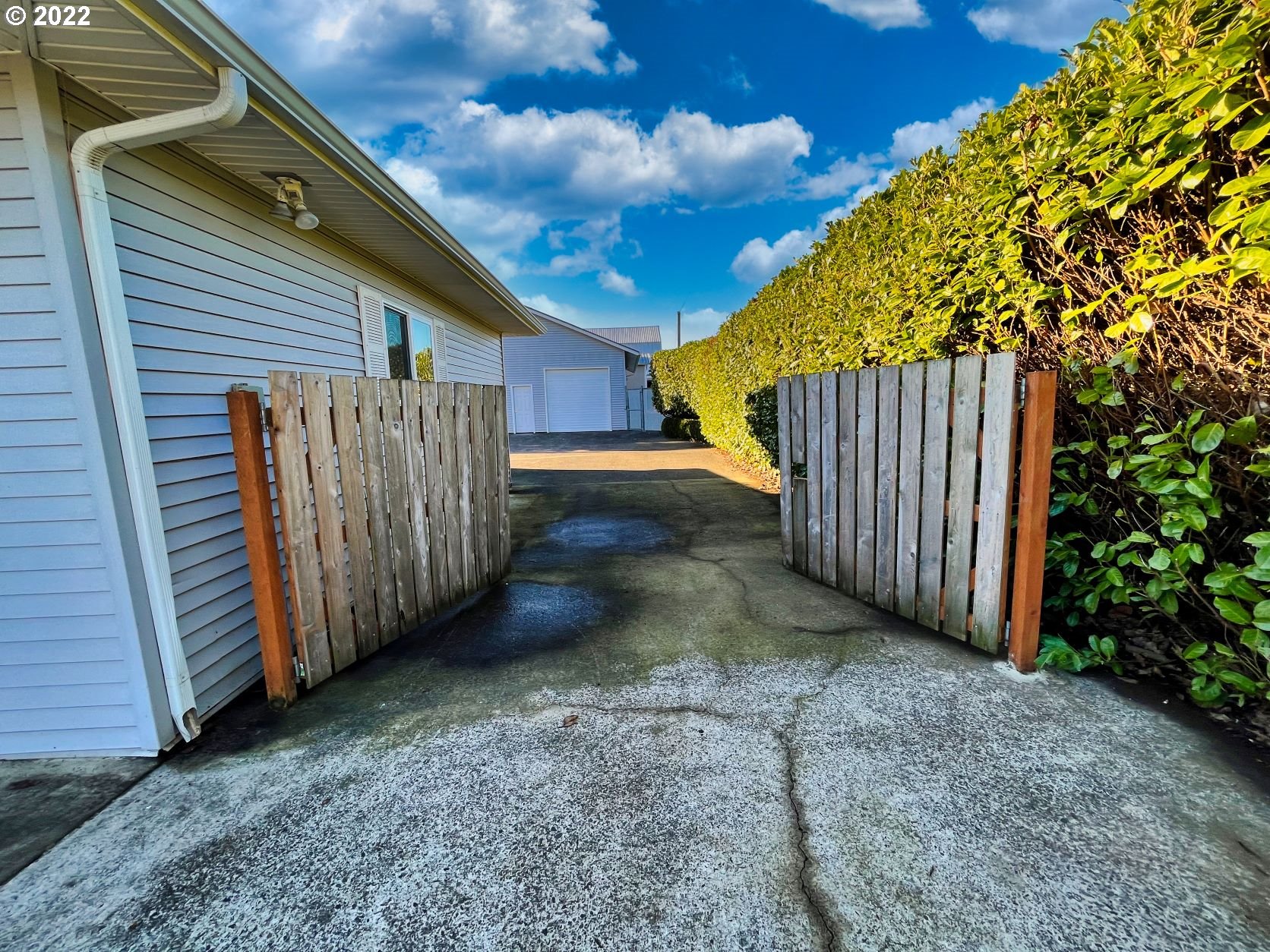 1675 Makinster Road Tillamook, OR 97141 - Photo 23 of 29 a view of a backyard with wooden fence