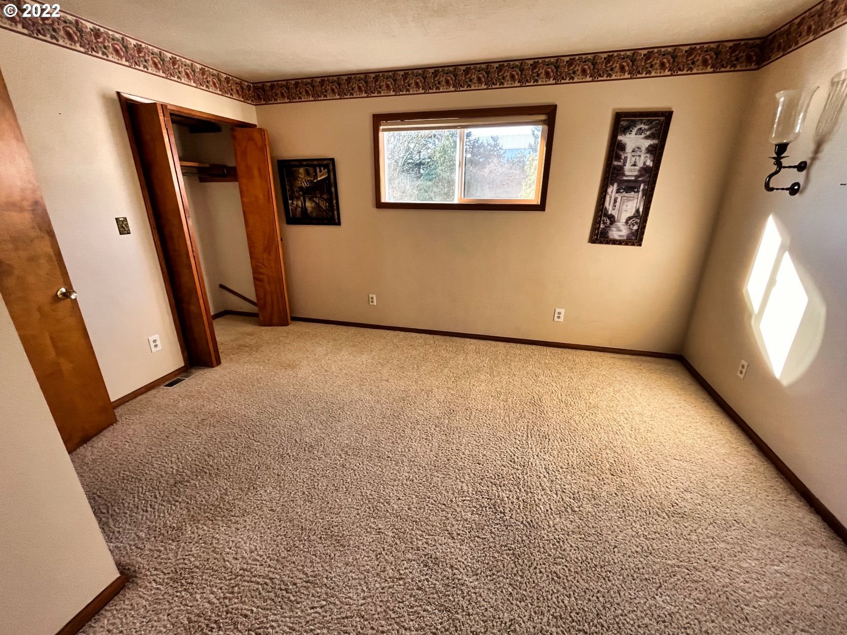 1675 Makinster Road Tillamook, OR 97141 - Photo 9 of 29 an empty room with windows
