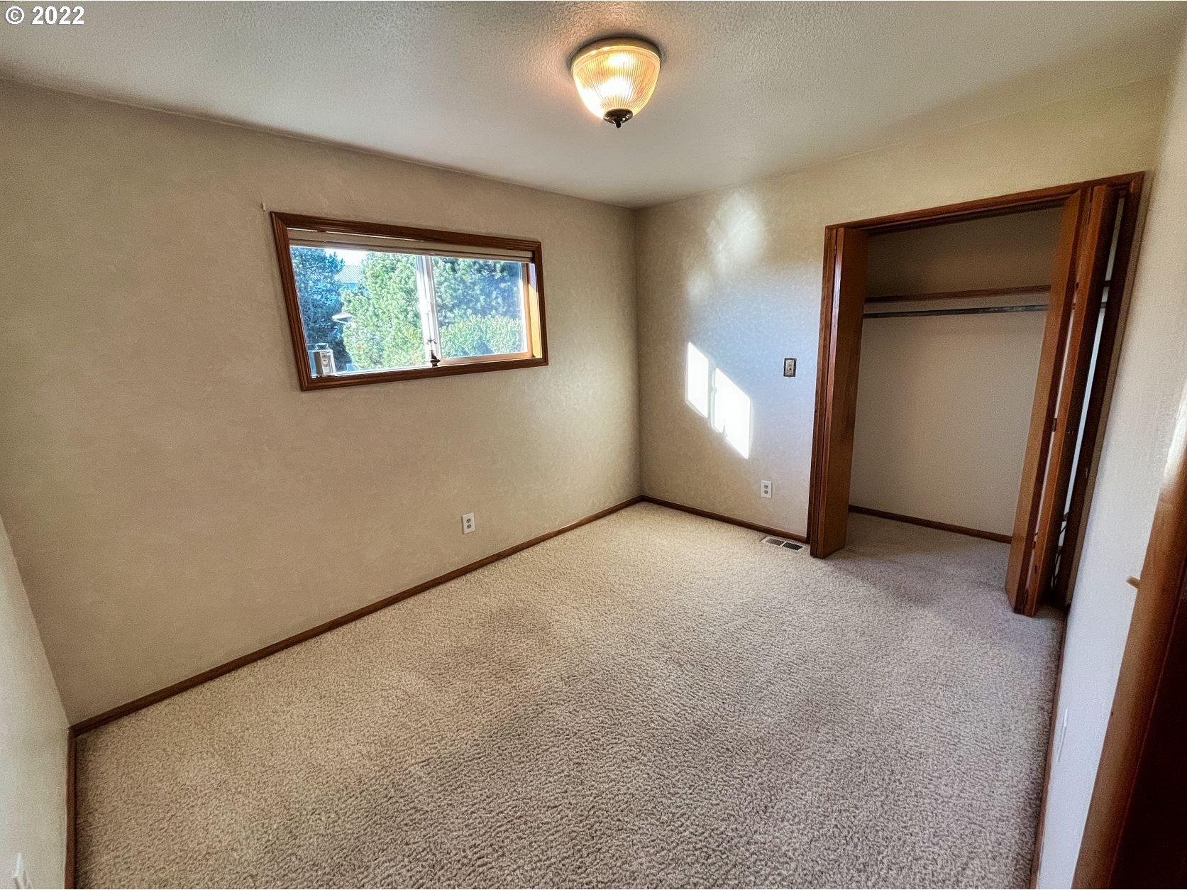 1675 Makinster Road Tillamook, OR 97141 - Photo 10 of 29 a view of an empty room with a window