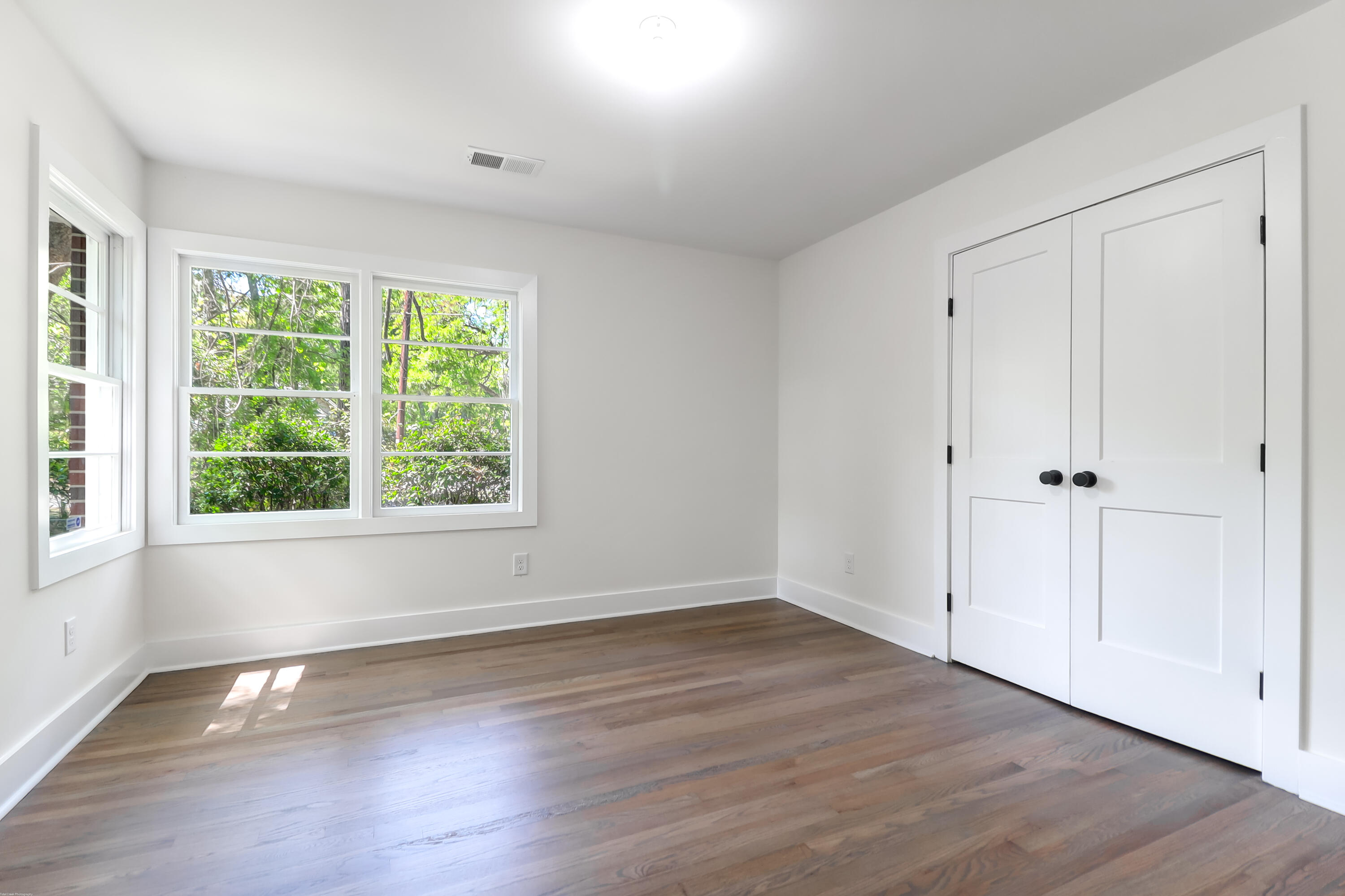 1447 Brian Road Charleston, SC 29407 - Photo 15 of 33 Primary bedroom with double closet doors
