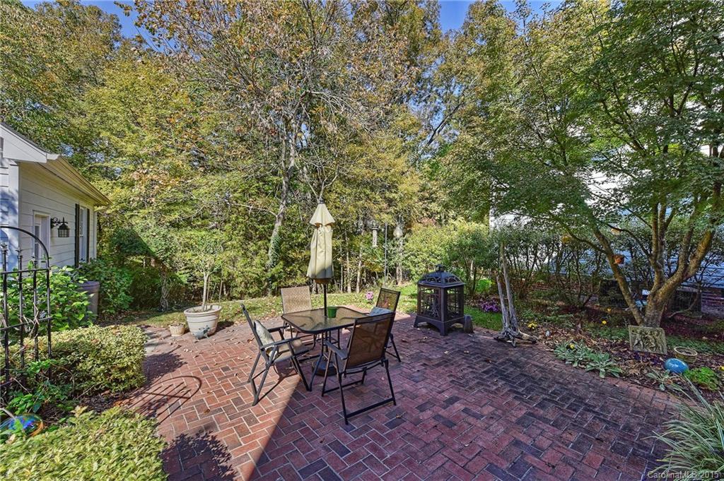 7109 Michael Scott Crossing Fort Mill, SC 29708 - Photo 22 of 24 a view of a tables and chairs in a backyard