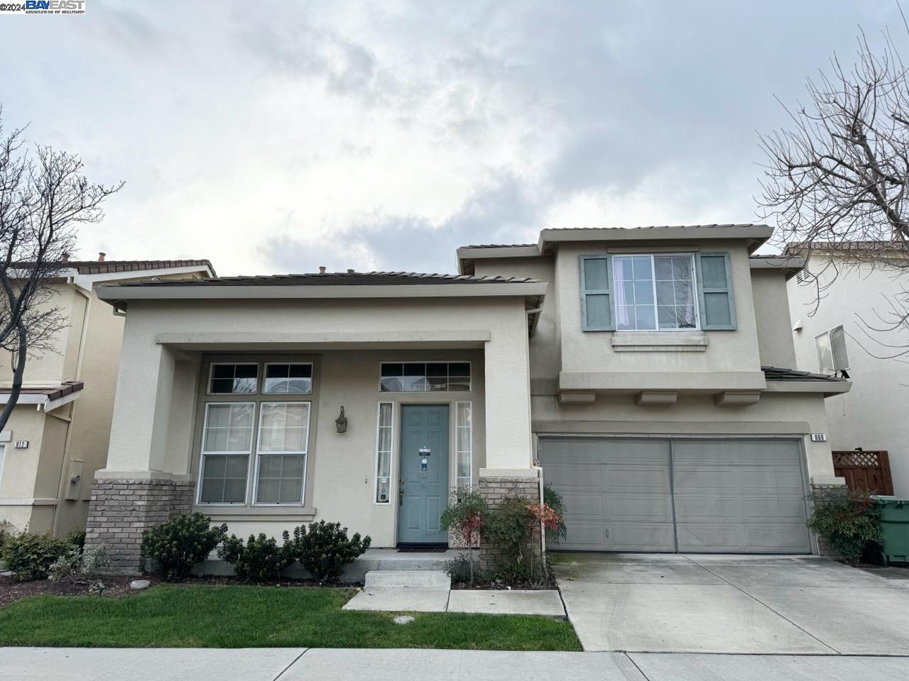 908 Cameron Circle Milpitas, CA 95035 - Photo 1 of 1 a front view of a house with garden
