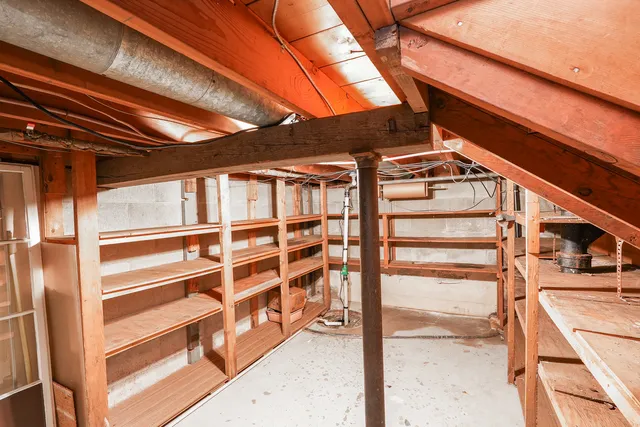 a kitchen with a stove and a refrigerator