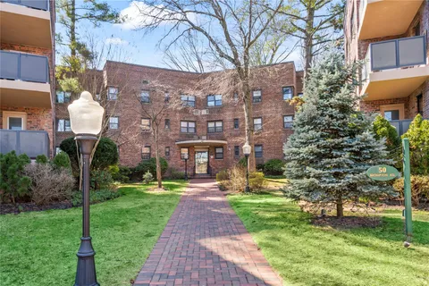 a view of a building with garden