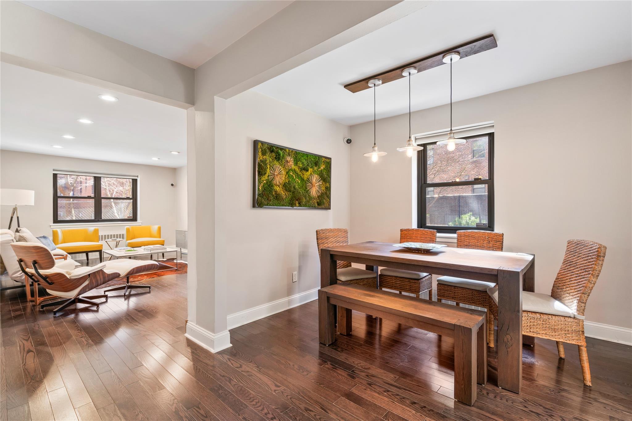 50 Brompton Road, Unit 1T Great Neck, NY 11021 - Photo 7 of 33 a view of a workspace with furniture and wooden floor