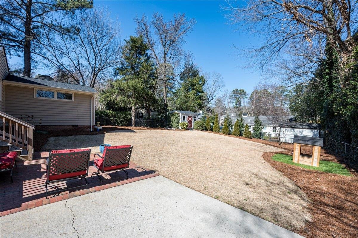 3426 Redbud Lane Raleigh, NC 27607 - Photo 26 of 30 Note-great storage shed on the back of the lot.