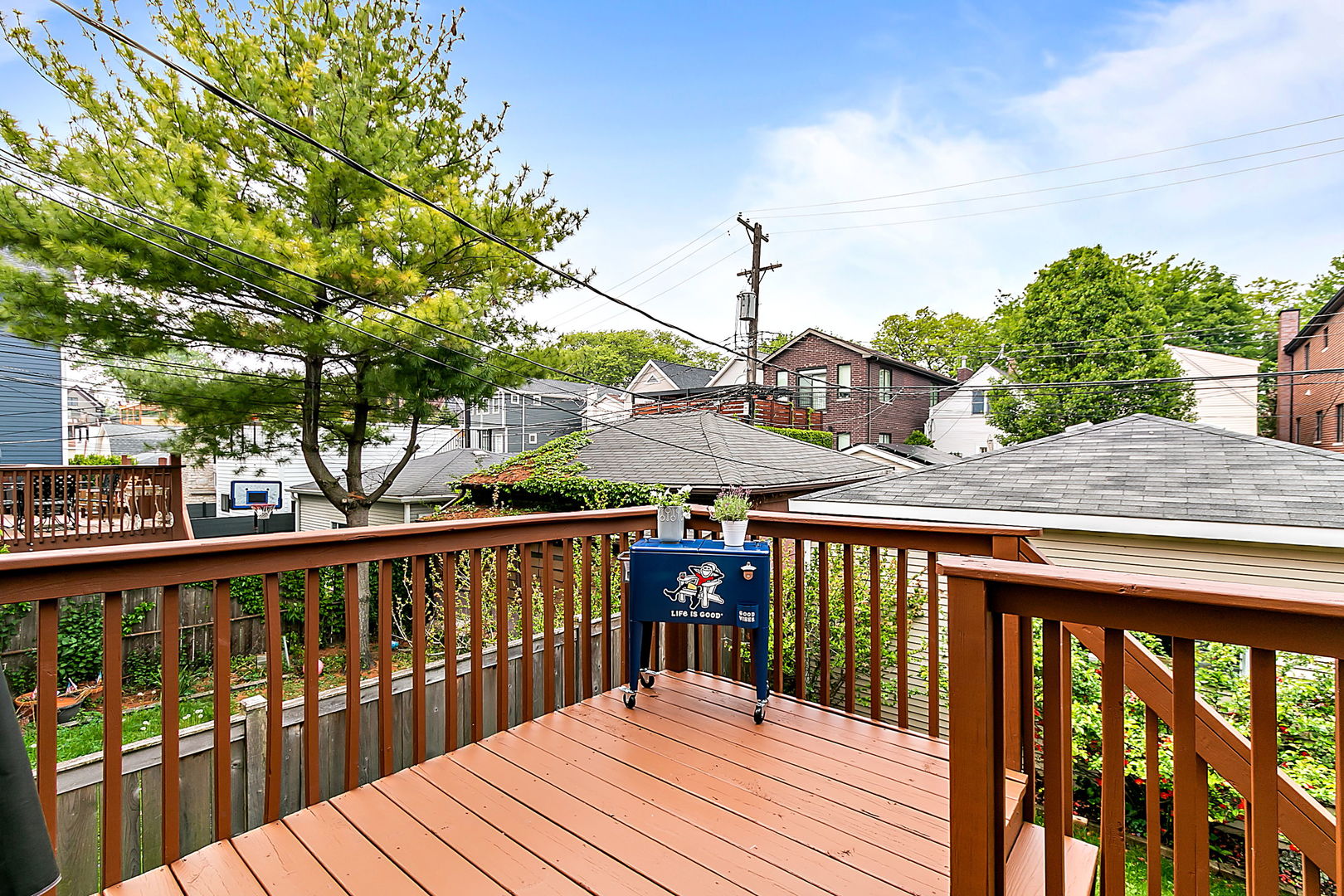 1910 West Barry Avenue Chicago, IL 60657 - Photo 14 of 33 a view of balcony with wooden floor and fence