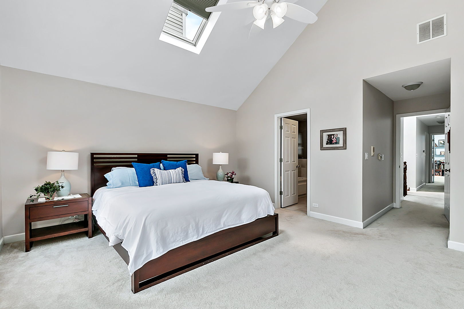1910 West Barry Avenue Chicago, IL 60657 - Photo 20 of 33 a bedroom with a bed and a chandelier