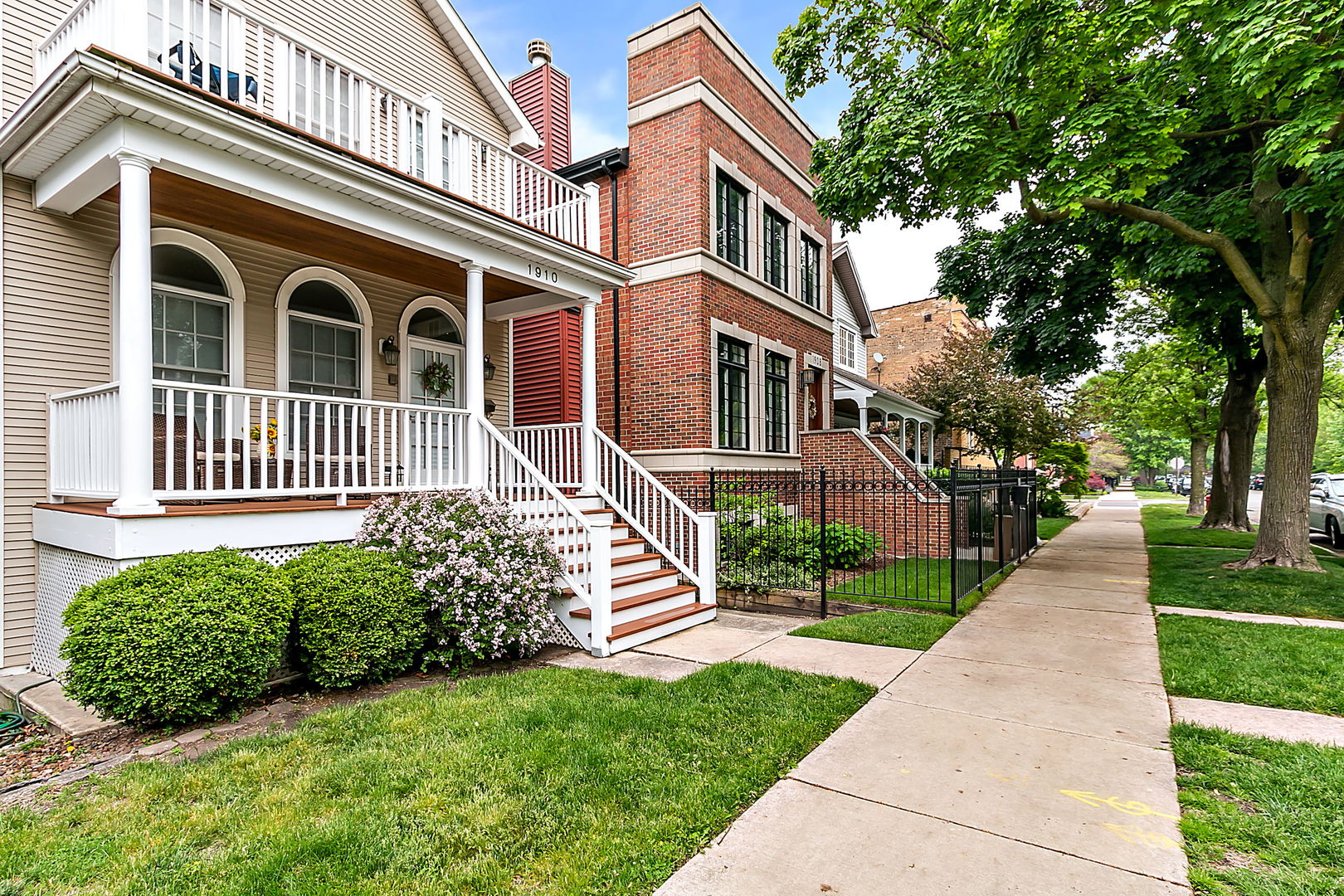 1910 West Barry Avenue Chicago, IL 60657 - Photo 2 of 33 a front view of a house with a yard