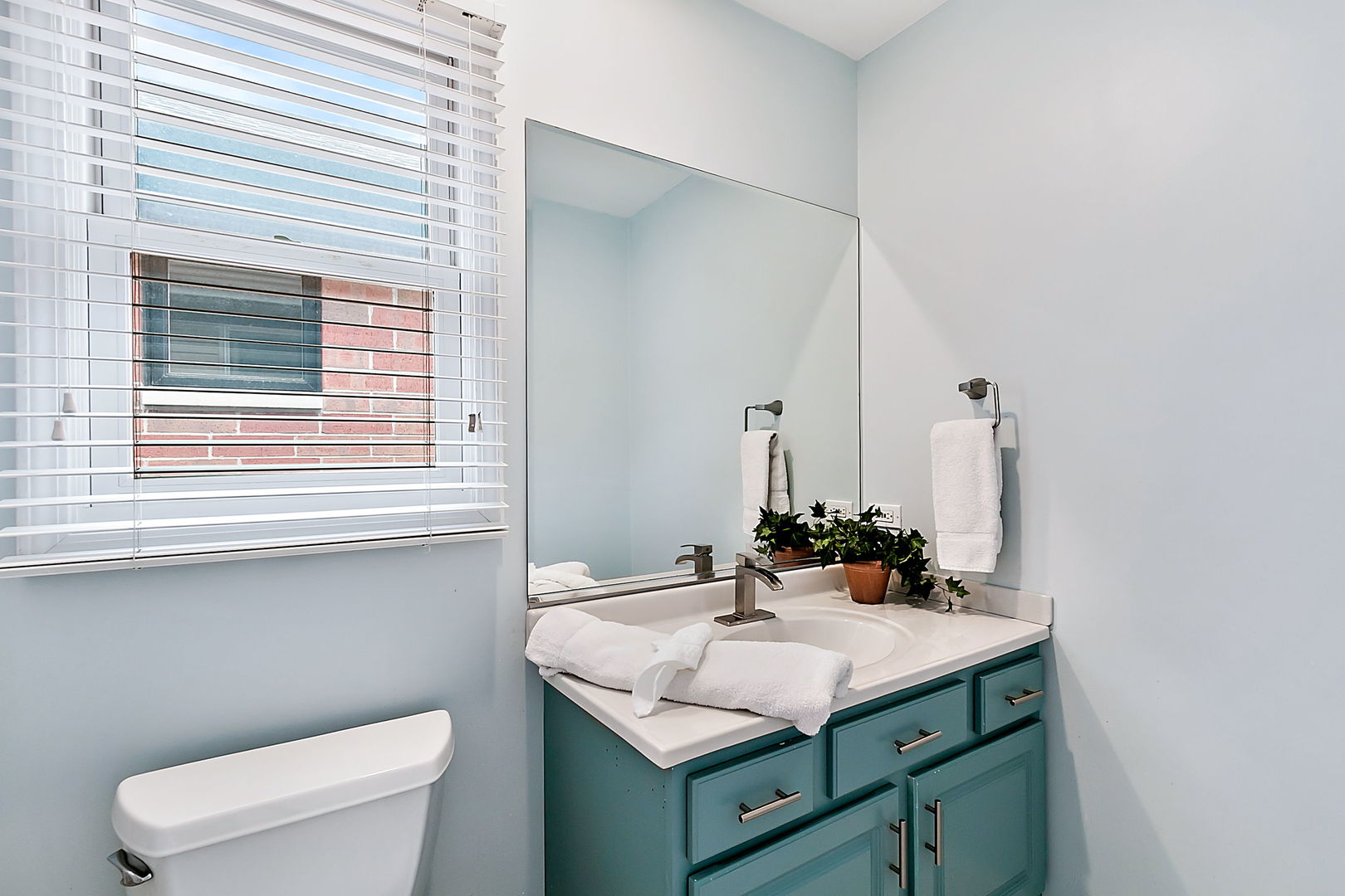 1910 West Barry Avenue Chicago, IL 60657 - Photo 24 of 33 a bathroom with a sink and a toilet