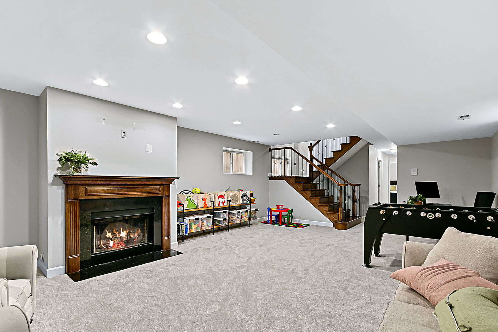 1910 West Barry Avenue Chicago, IL 60657 - Photo 29 of 33 a bedroom with furniture and a fireplace