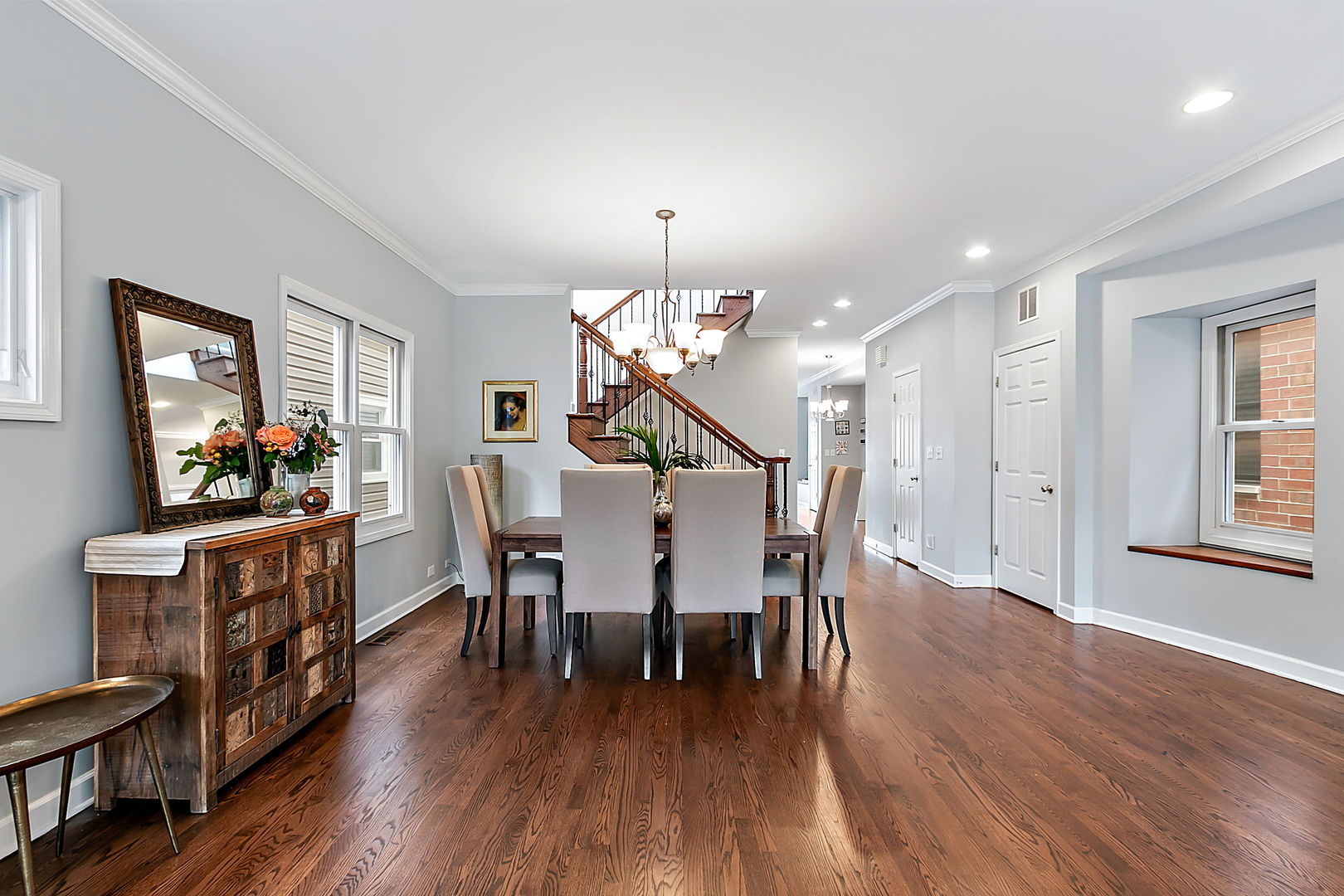 1910 West Barry Avenue Chicago, IL 60657 - Photo 6 of 33 a view of a dining room with furniture and wooden floor
