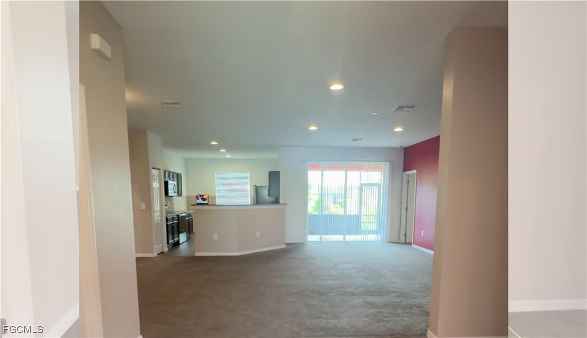 1473 Bush Street West Immokalee, FL 34142 - Photo 2 of 9 a view of a kitchen and a window