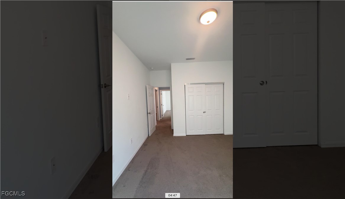 1473 Bush Street West Immokalee, FL 34142 - Photo 7 of 9 a view of hallway