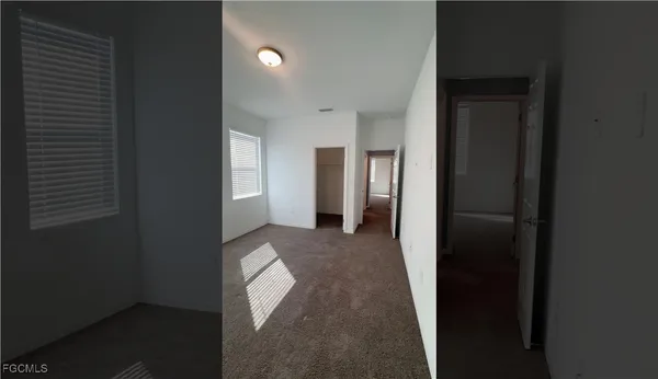 a view of hallway with wooden floor