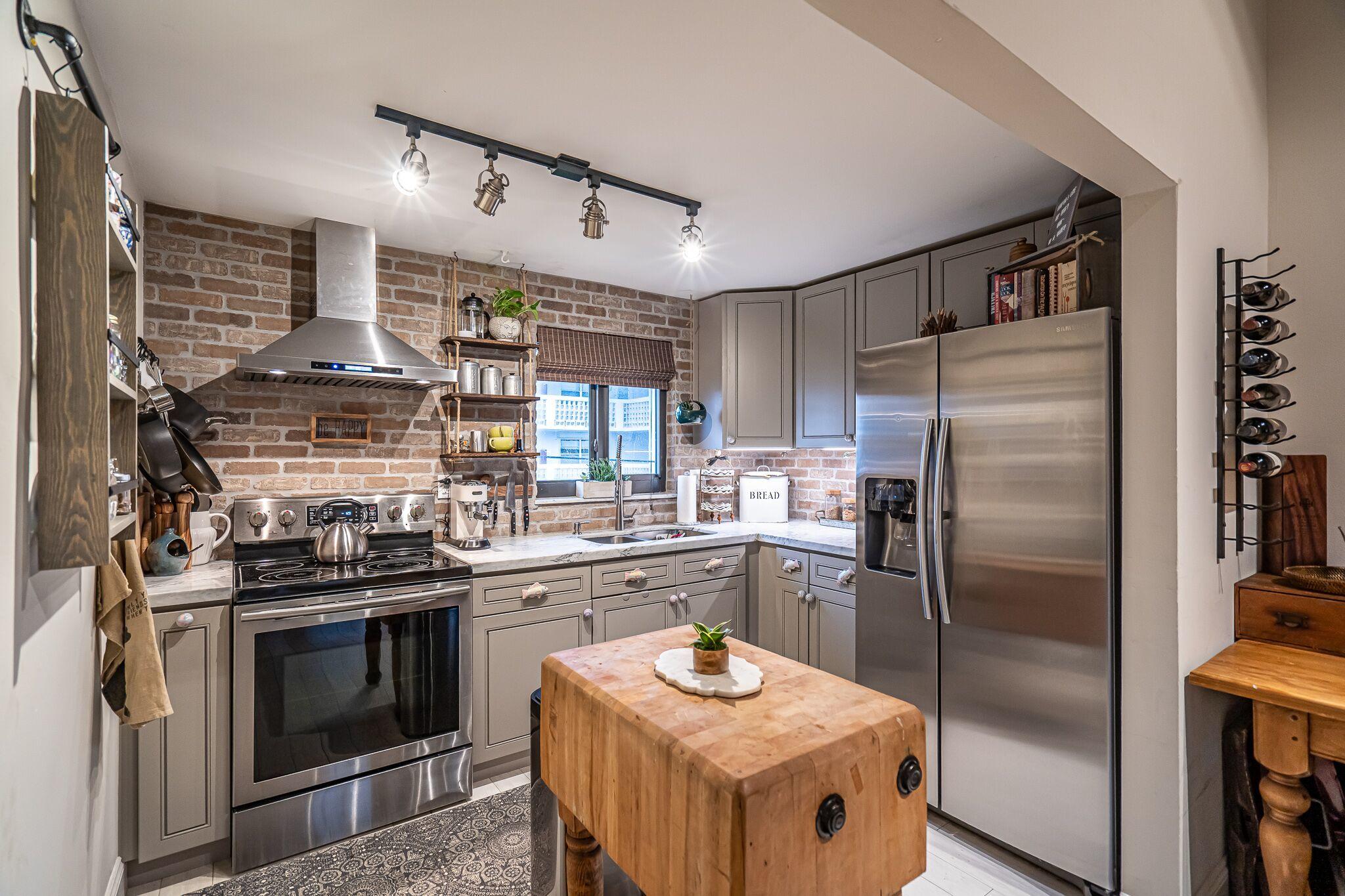 50 Southeast 12th Street, Unit 220 Boca Raton, FL 33432 - Photo 4 of 14 Kitchen 3