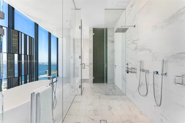 a kitchen with a refrigerator and cabinets