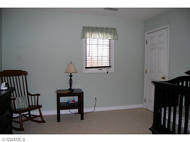 14411 Helmsley Road Midlothian, VA 23113 - Photo 12 of 17 Other - Exercise room on the 3rd floor or could be 5th bedroom. Double door closet and ceiling fan with light. Newer carpet.