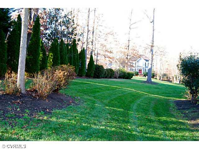 14411 Helmsley Road Midlothian, VA 23113 - Photo 15 of 17 Exterior Front - Another view of the front yard taken from the front walkway & driveway