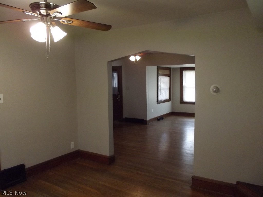 3363 Berea Road Cleveland, OH 44111 - Photo 18 of 50 Empty room featuring ceiling fan and dark wood-type flooring