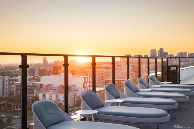 a balcony with furniture and outdoor view