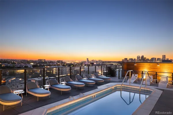 a view of a swimming pool with a patio