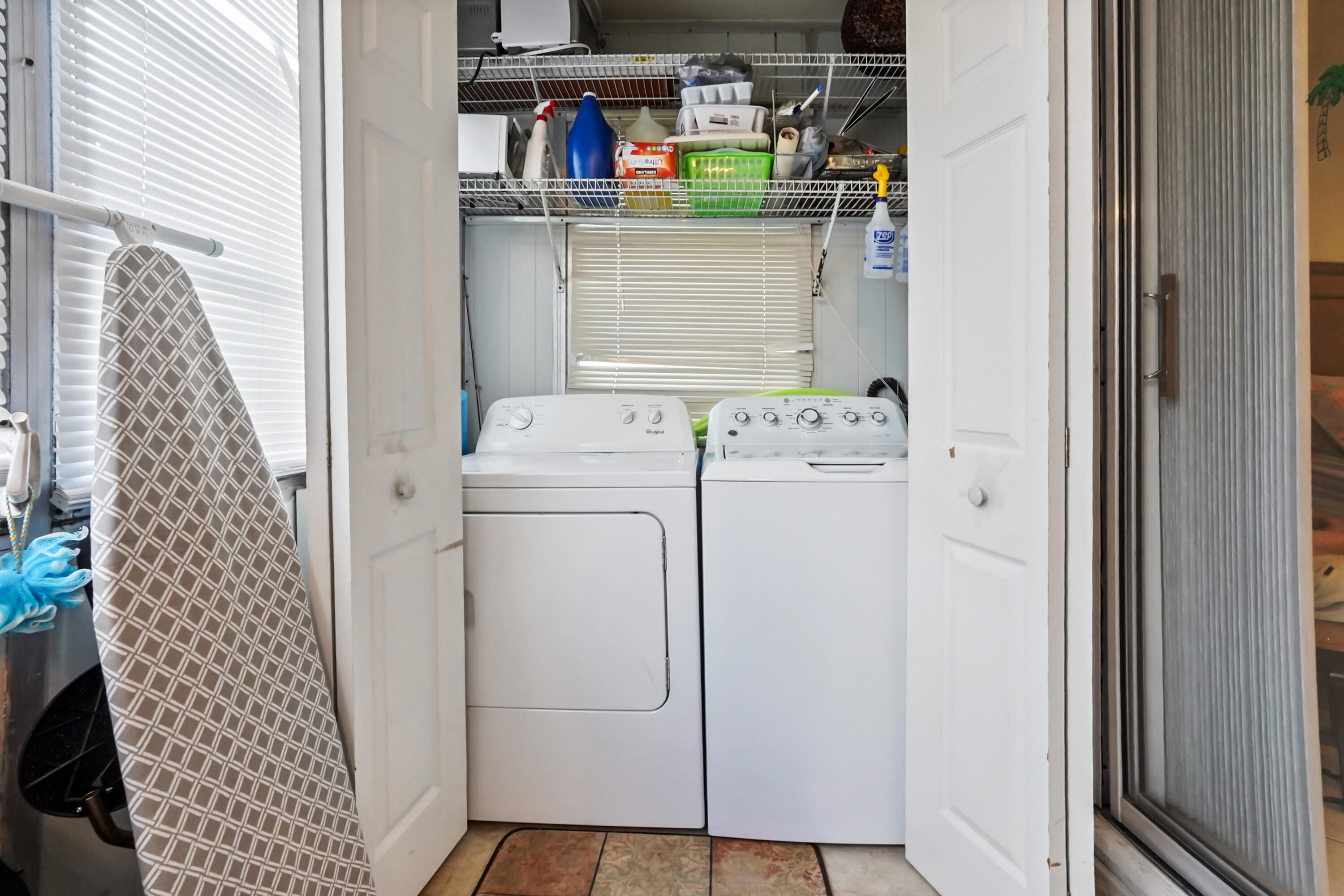 52 Saxony B Delray Beach, FL 33446 - Photo 19 of 21 a utility room with dryer and washer