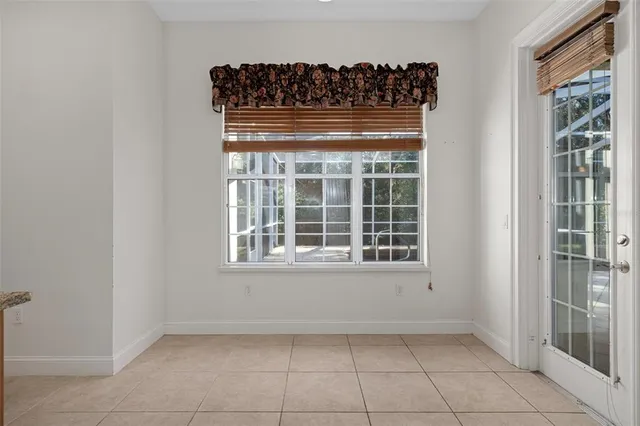 a bathroom with a double vanity sink and mirror