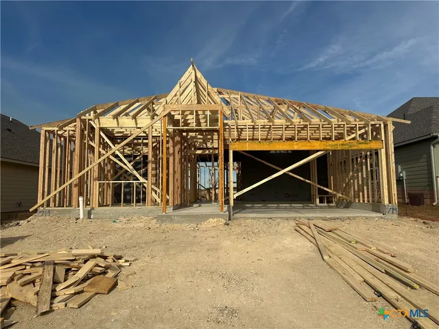 a view of garage with wooden floor