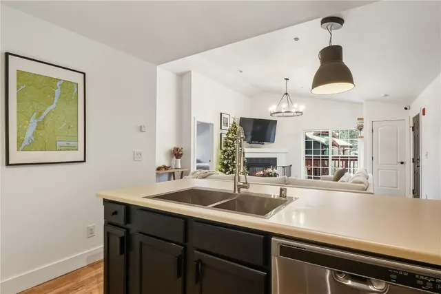 a kitchen with a sink and a stove
