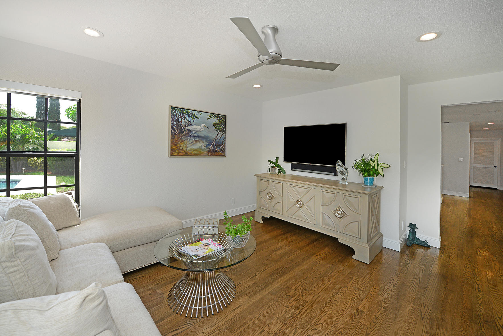 21760 Club Villa Terrace Boca Raton, FL 33433 - Photo 27 of 38 a living room with furniture and a flat screen tv