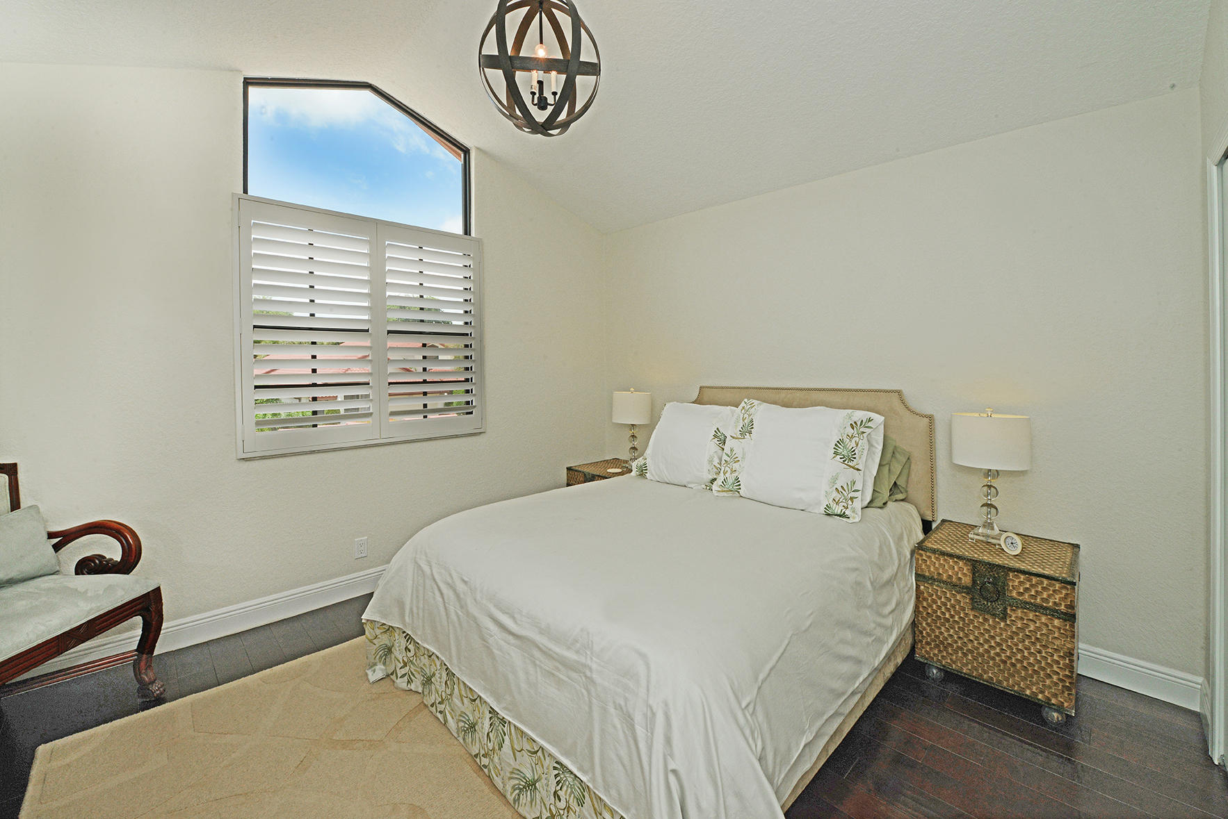 21760 Club Villa Terrace Boca Raton, FL 33433 - Photo 29 of 38 a bedroom with a bed and a window
