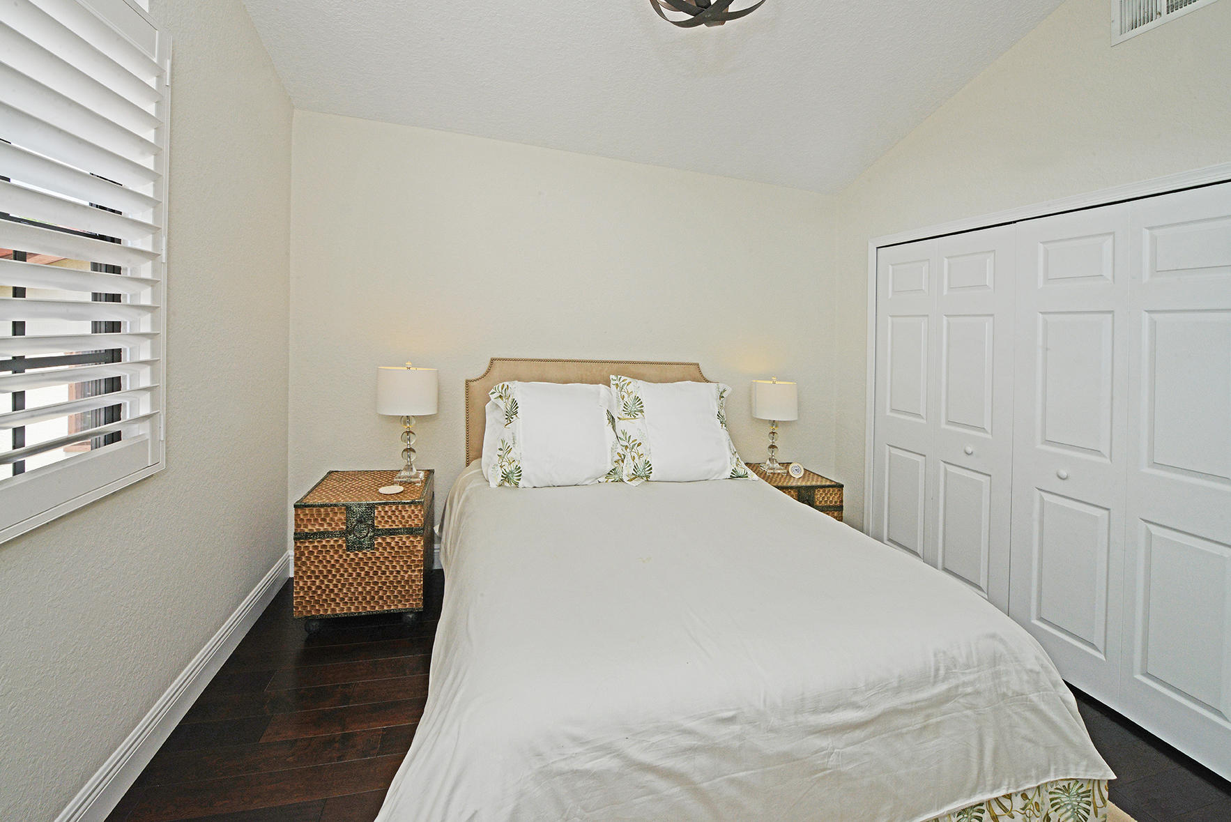 21760 Club Villa Terrace Boca Raton, FL 33433 - Photo 30 of 38 a bedroom with a bed and window