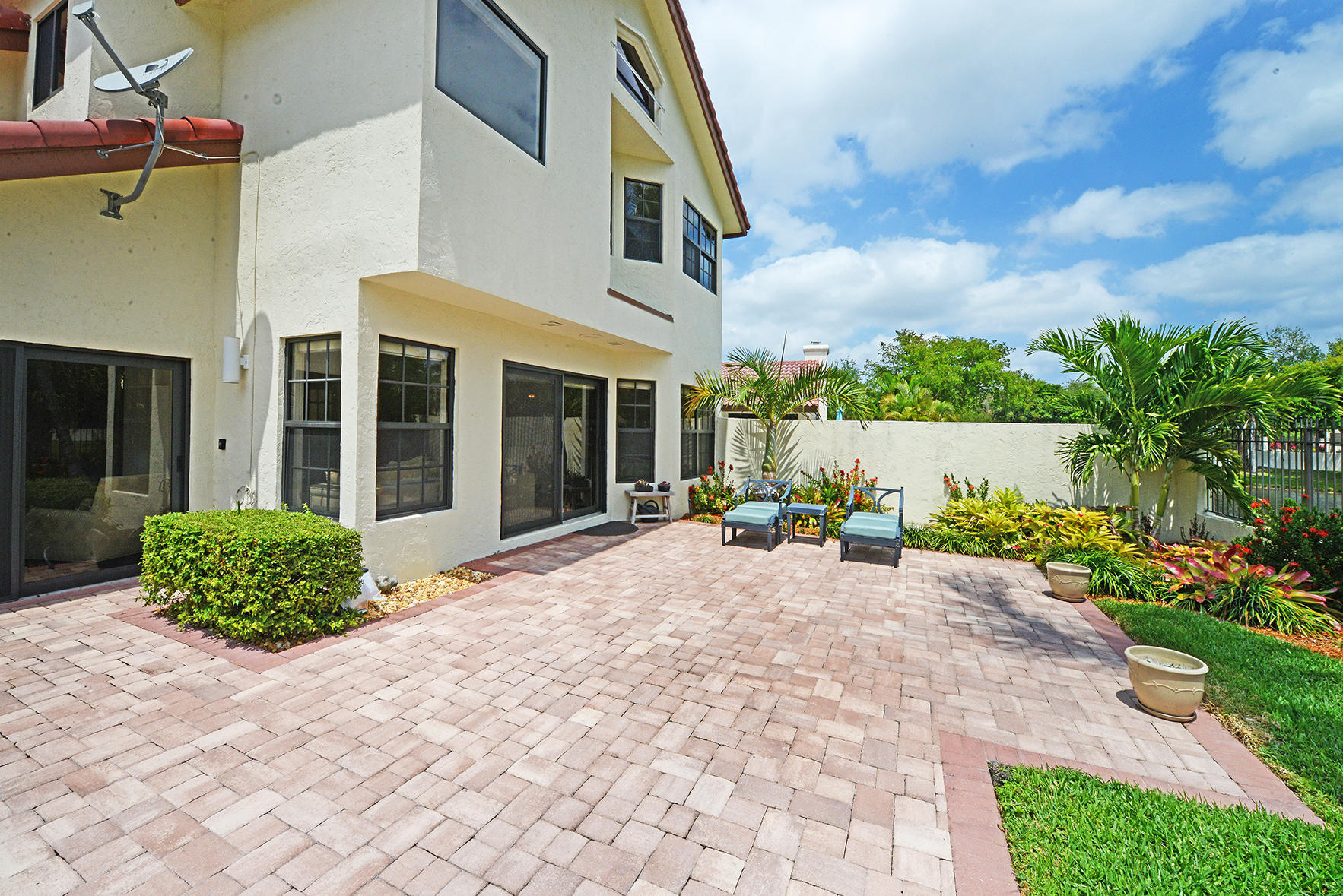 21760 Club Villa Terrace Boca Raton, FL 33433 - Photo 6 of 38 a view of a house with backyard and garden