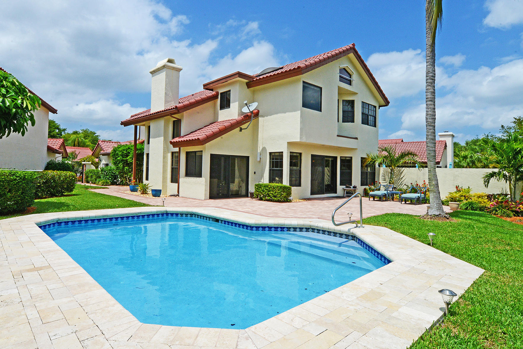 21760 Club Villa Terrace Boca Raton, FL 33433 - Photo 9 of 38 a view of outdoor space yard swimming pool and porch