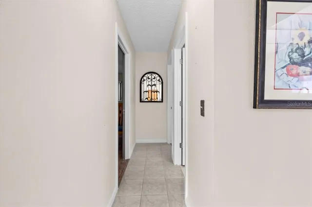 a view of livingroom with a ceiling fan and window