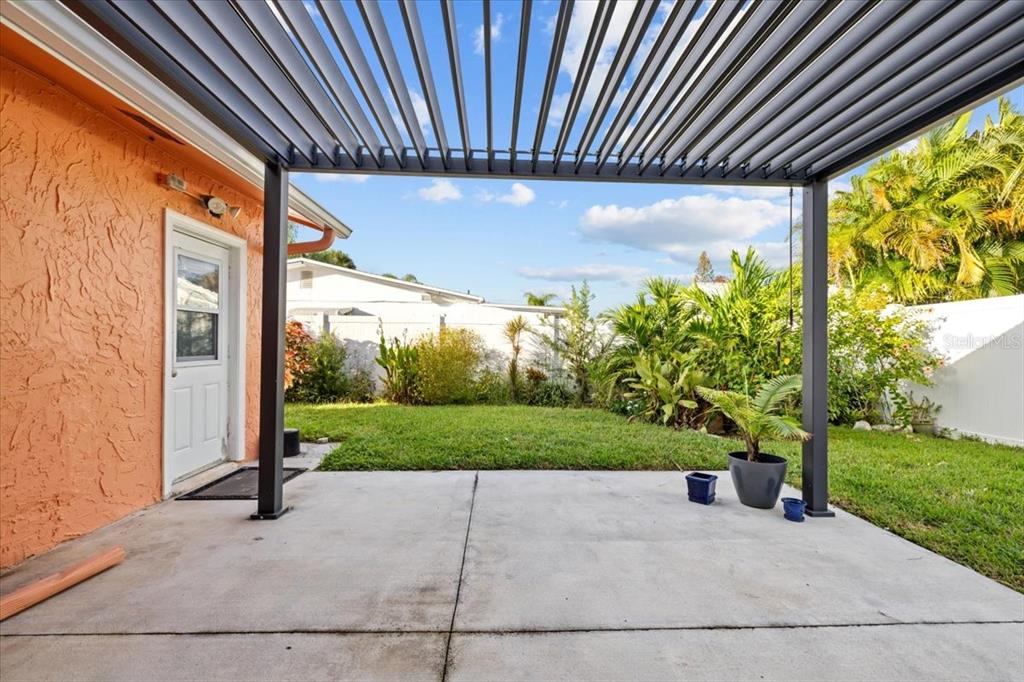 4880 Shell Stream Boulevard New Port Richey, FL 34652 - Photo 35 of 57 a view of a patio