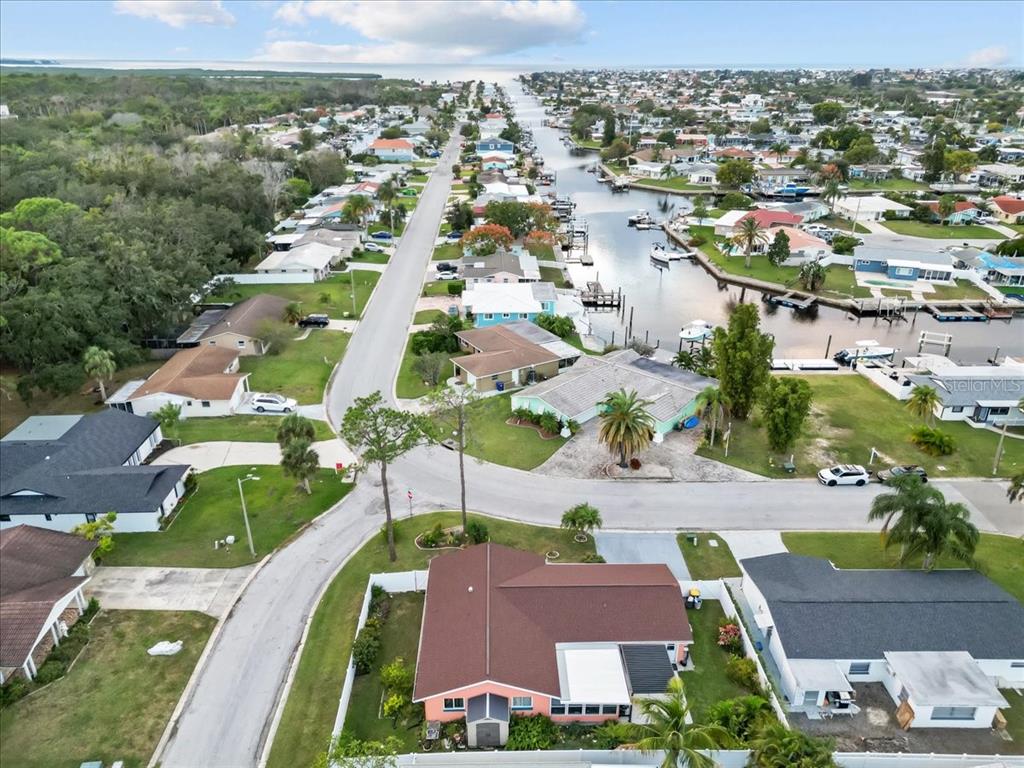4880 Shell Stream Boulevard New Port Richey, FL 34652 - Photo 37 of 57 an aerial view of residential houses with outdoor space