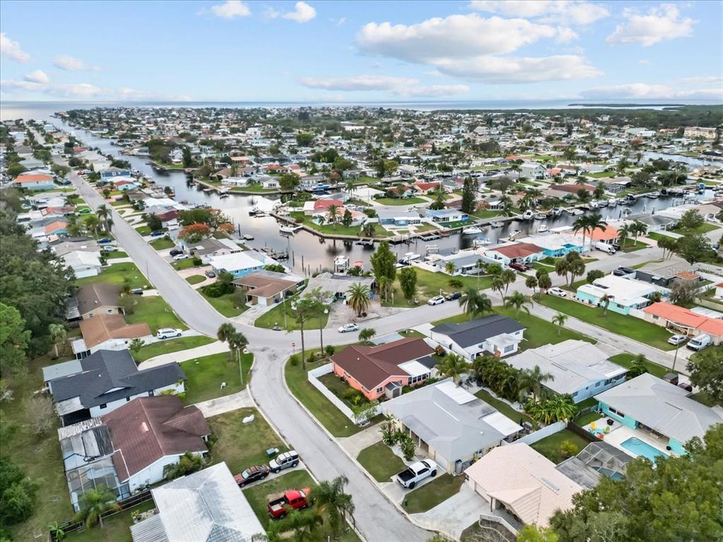4880 Shell Stream Boulevard New Port Richey, FL 34652 - Photo 38 of 57 an aerial view of residential houses with outdoor space