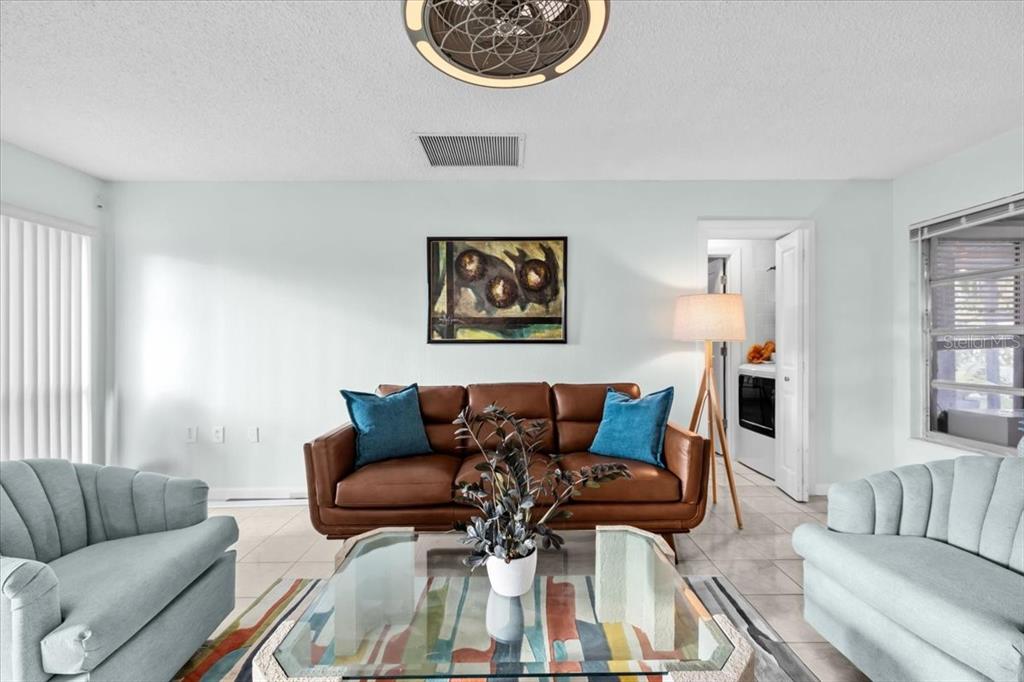 4880 Shell Stream Boulevard New Port Richey, FL 34652 - Photo 9 of 57 a view of a livingroom with furniture and a couch