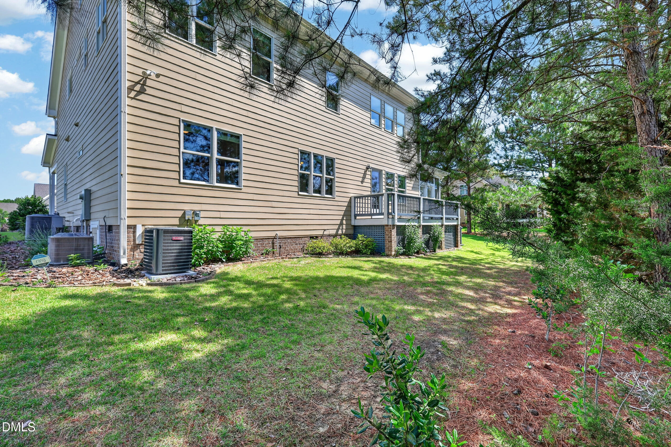 261 Character Drive Rolesville, NC 27571 - Photo 66 of 77 a view of a house with backyard and sitting area