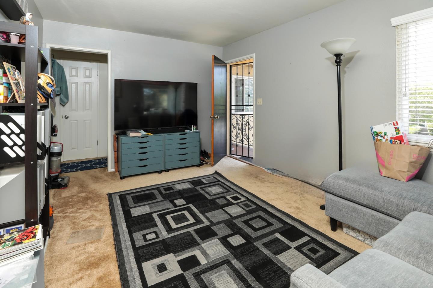 494 Dover Way Campbell, CA 95008 - Photo 11 of 28 a living room with furniture and a flat screen tv