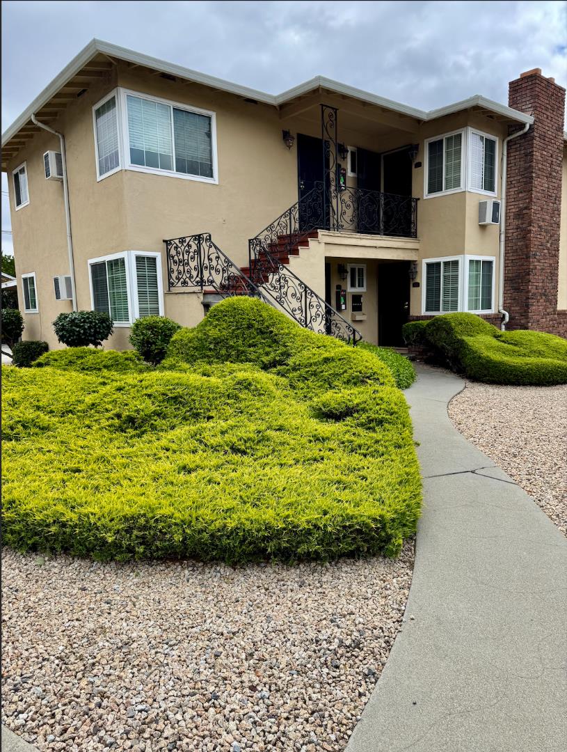 494 Dover Way Campbell, CA 95008 - Photo 2 of 28 a front view of a house with a yard