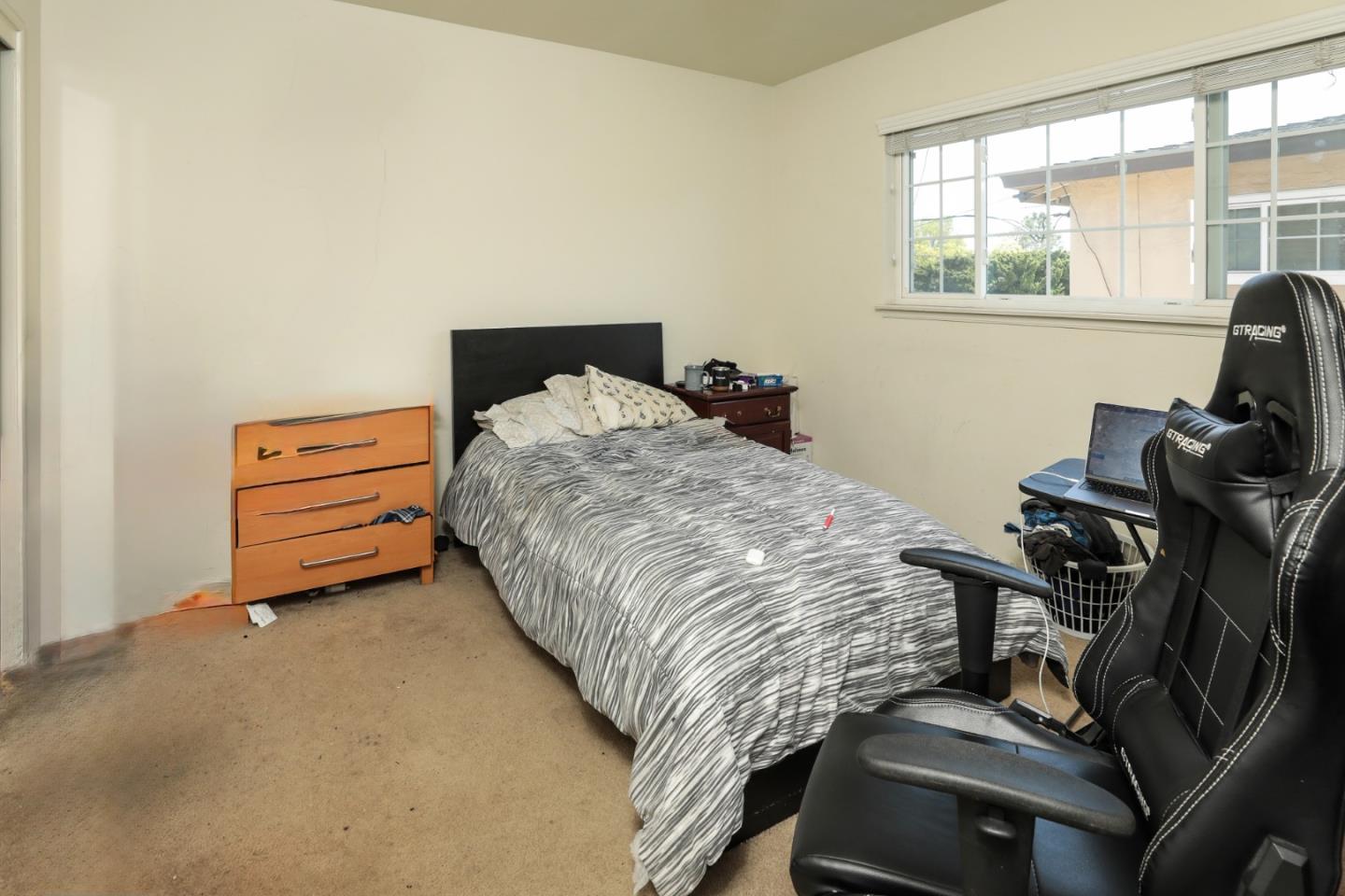494 Dover Way Campbell, CA 95008 - Photo 22 of 28 a bedroom with a bed and a window
