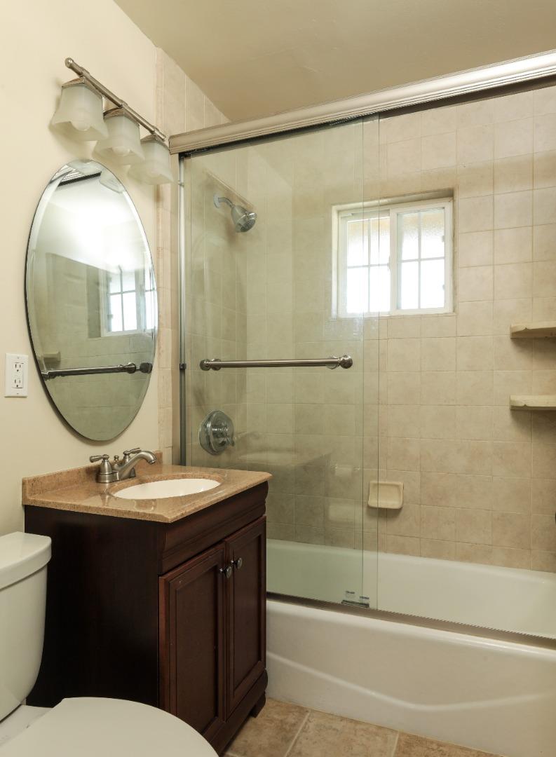 494 Dover Way Campbell, CA 95008 - Photo 7 of 28 a bathroom with a sink and a mirror