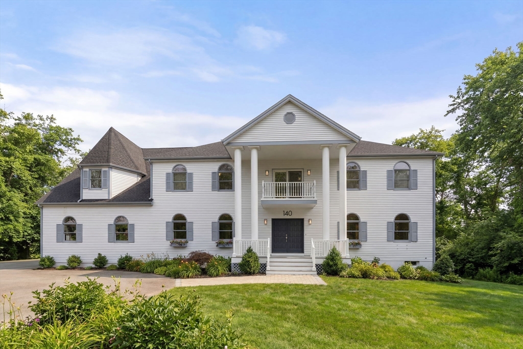 a view of house with yard