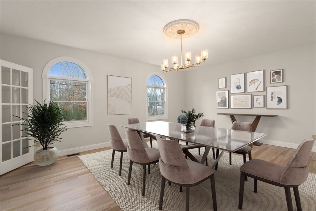 140 York Street Canton, MA 02021 - Photo 13 of 27 a view of a dining room with furniture window and wooden floor